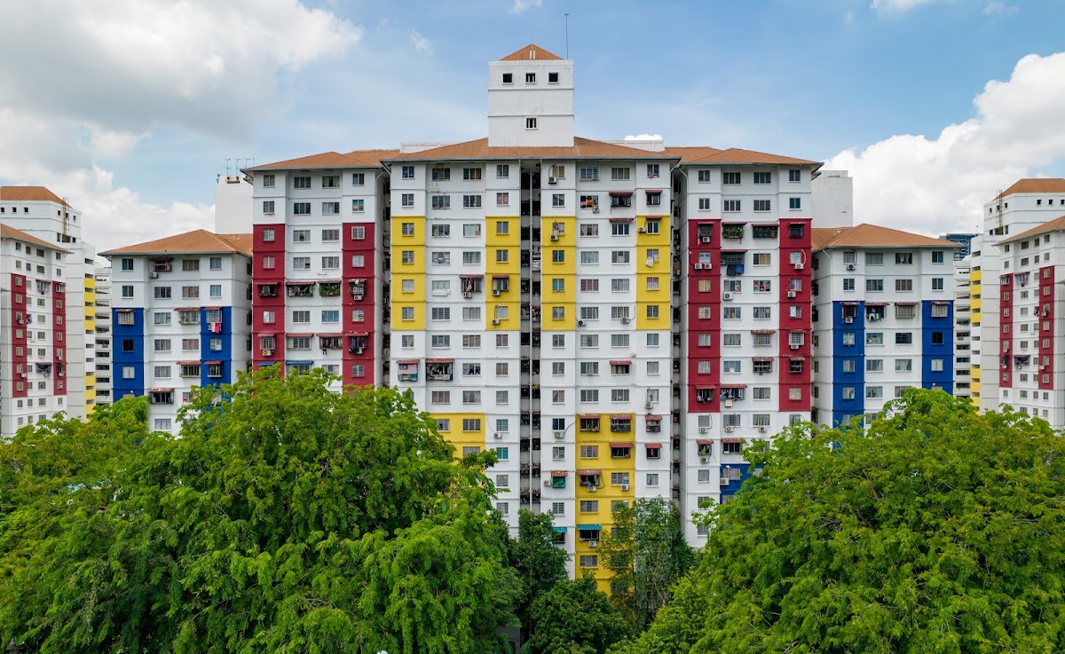 PPR Kerinchi: the flats' colour-banded blocks above the trees