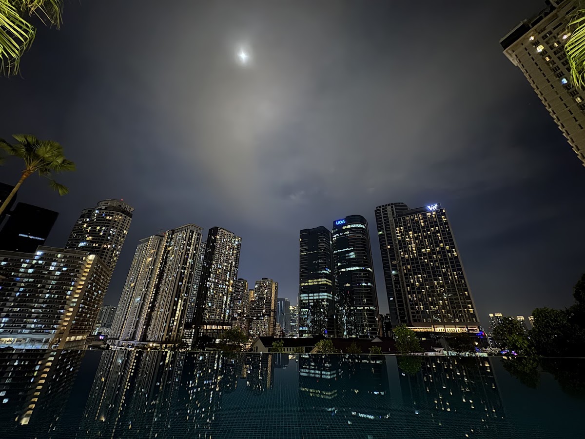 Acacia @ The Park Residences: Bangsar South's towers at night above the infinity pool