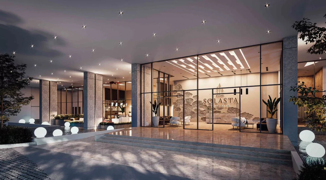 Artist's impression of Solasta Dutamas: night view of the entrance: glazed lobby with Solasta wall lettering, a star-lit canopy and glowing globe lights
