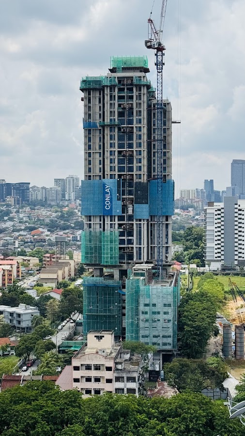 The Lantern Bangsar: the tower under construction above the neighbourhood's houses