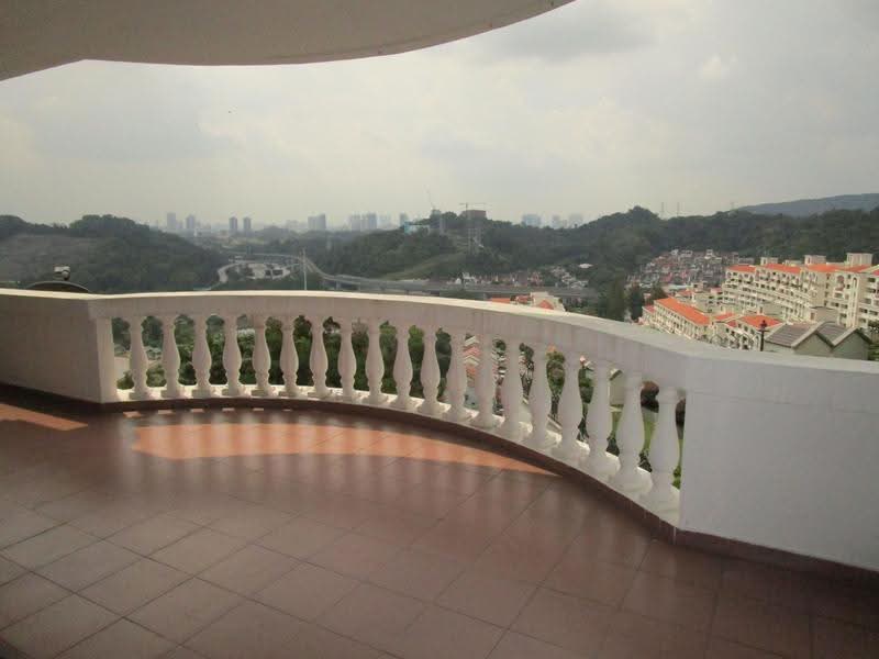 Impian Emas: Outlook over wooded hills, highway and low-rise housing from balcony