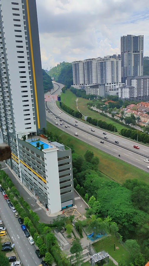 Kiara Kasih: the tower beside the highway, from above