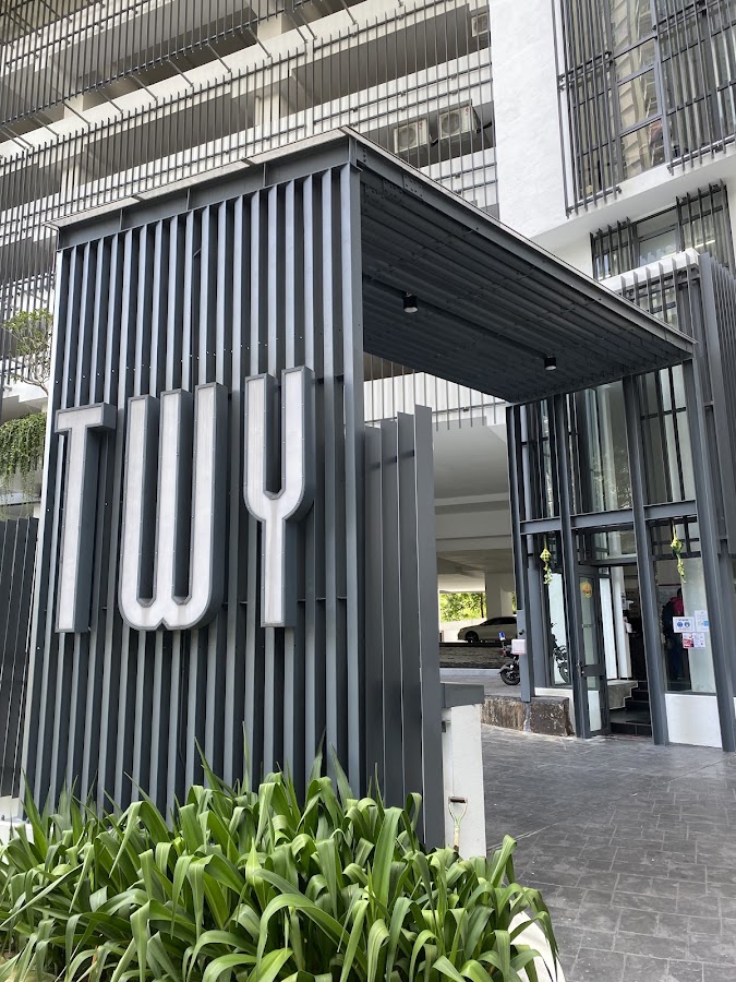 TWY Mont Kiara: the TWY sign beside the entrance canopy