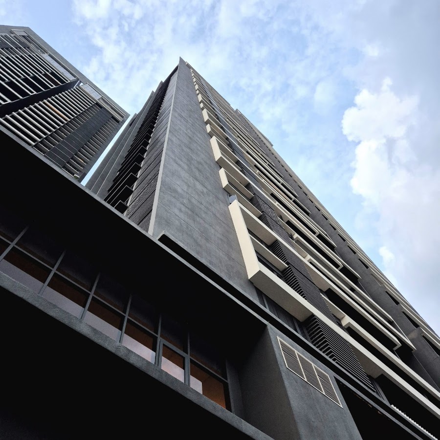 The Estate @ South Bangsar: the tower from below against the clouds