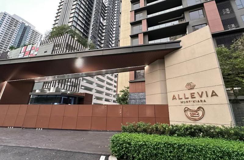Allevia: Entrance signage wall reading Allevia Mont Kiara with towers behind