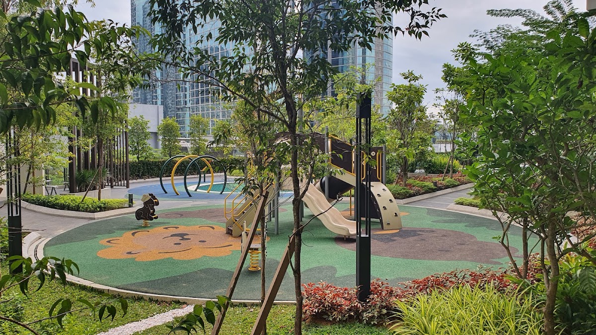 The Goodwood Residence: the children's playground in the landscaped garden