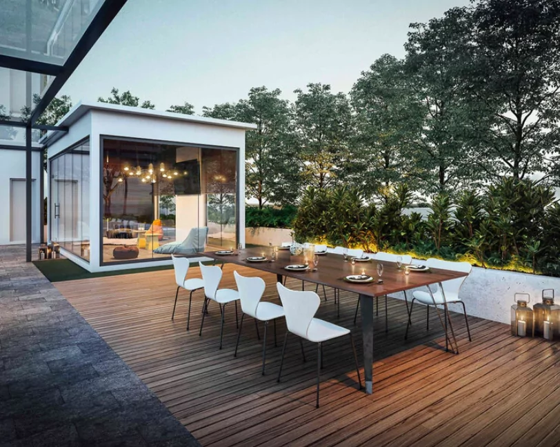 Artist's impression of Solasta Dutamas: rooftop timber deck with a long dining table, white chairs and a glass-walled pavilion
