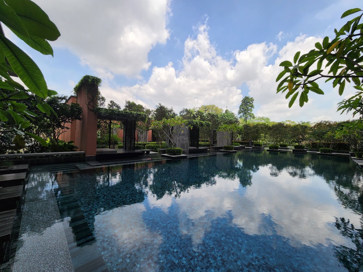 The Estate @ South Bangsar: the pool reflecting the sky, pergolas beyond