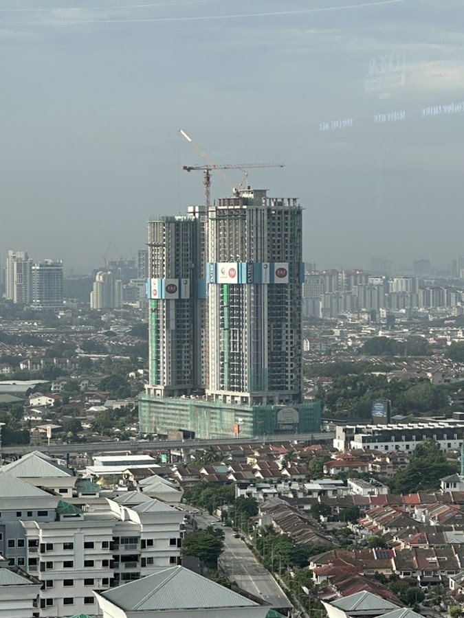 Grand Damansara: the tower under construction, seen across the rooftops