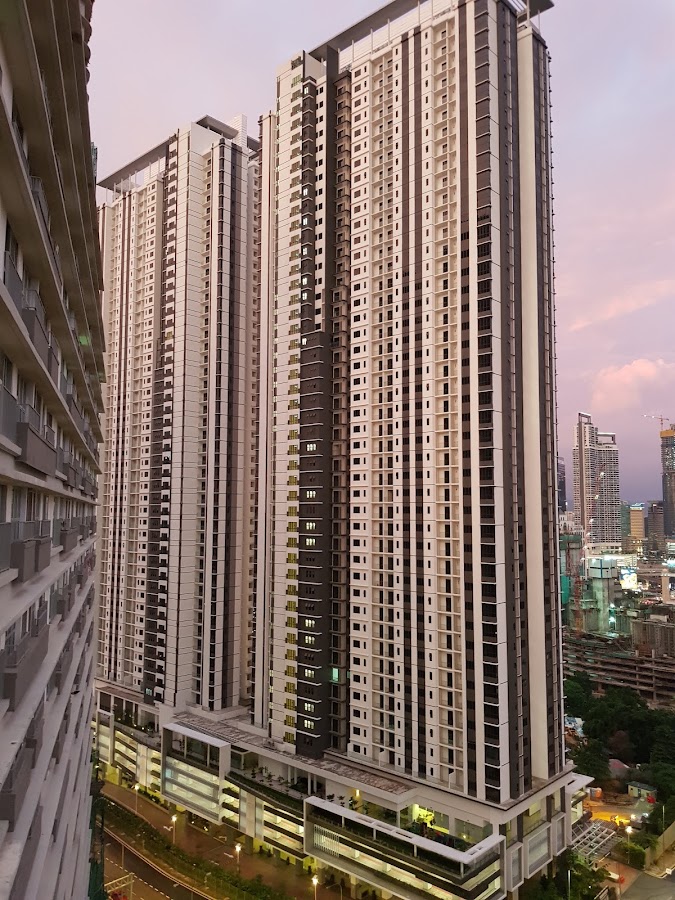Residensi Kerinchi: the tower at dusk, seen from a neighbouring block