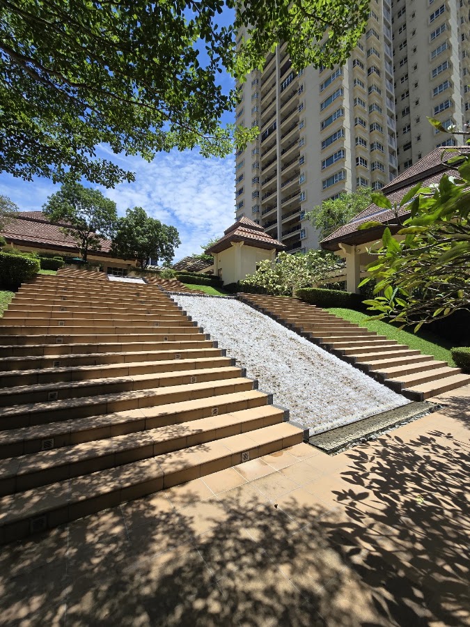Mont Kiara Aman: a stepped cascade in the grounds, a tower above