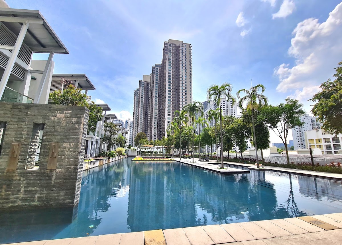 Kiara Designer Suites: the long pool with the towers beyond