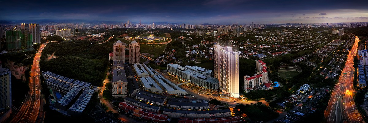 Artist's impression of Dorsett Residences Sri Hartamas: the tower among the neighbourhood from the air at dusk