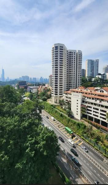 Menara Bangsar: Elevated outlook over a multi-lane highway, trees, nearby towers and the city skyline