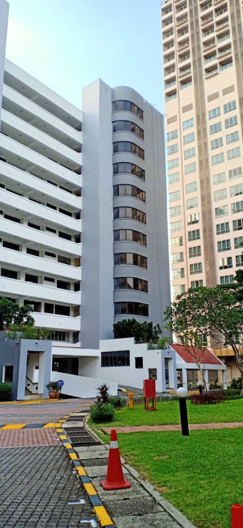 Menara Hartamas: Exterior view of residential tower buildings with grounds, walkway, and landscaping