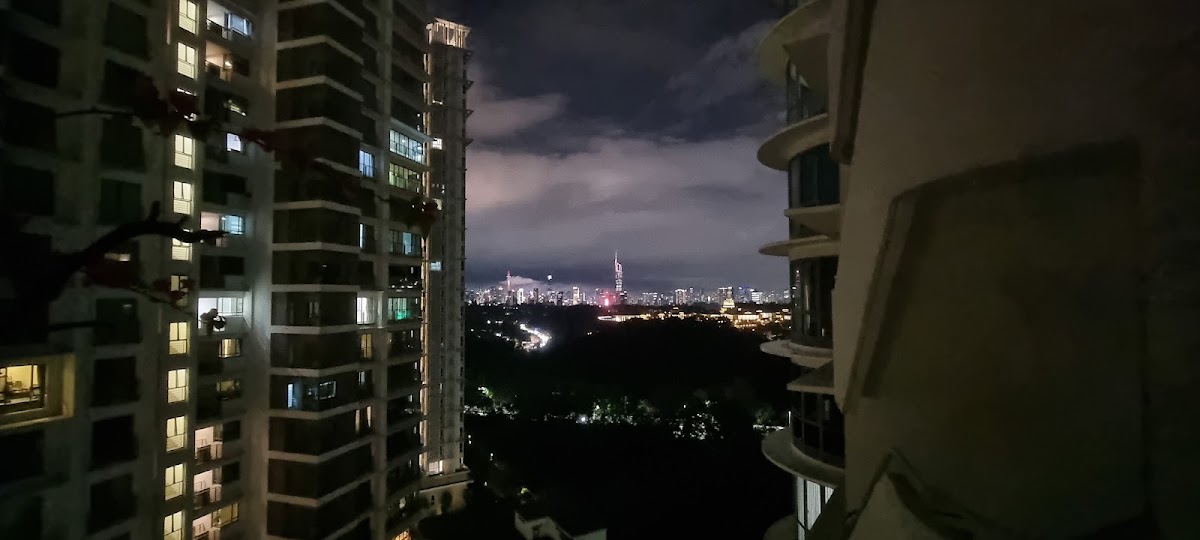 Mont Kiara Aman: the city's lights at night between the towers