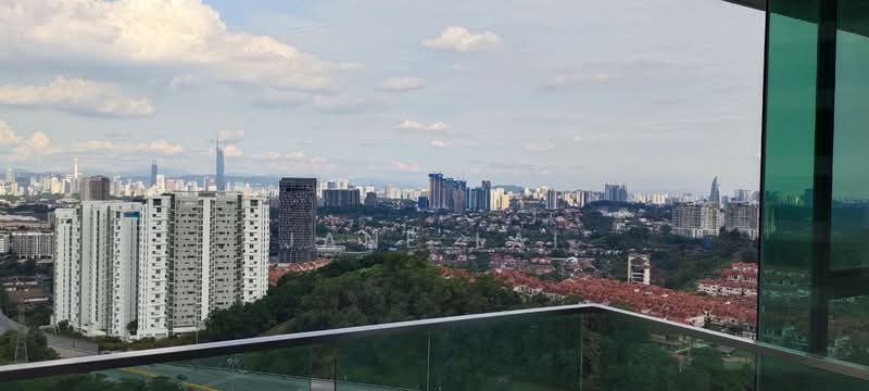 Kiaramas Danai: city skyline and rooftops from a balcony behind glass balustrade