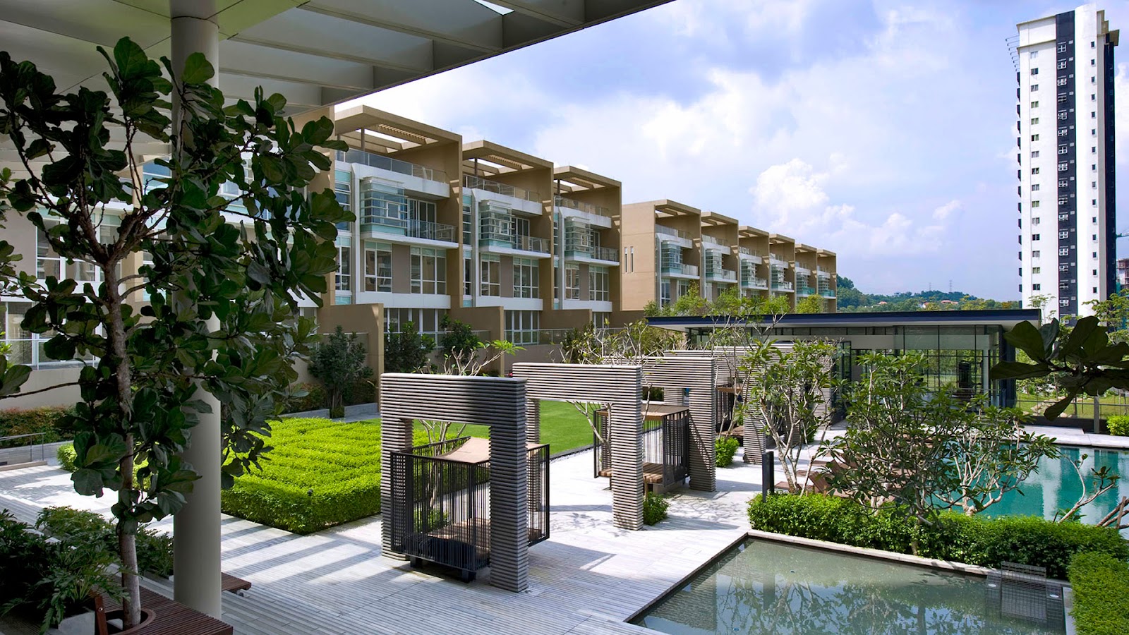 One Menerung: Residential development courtyard with landscaped gardens, pergola walkways, swimming pool, and multi-story buildings in the background