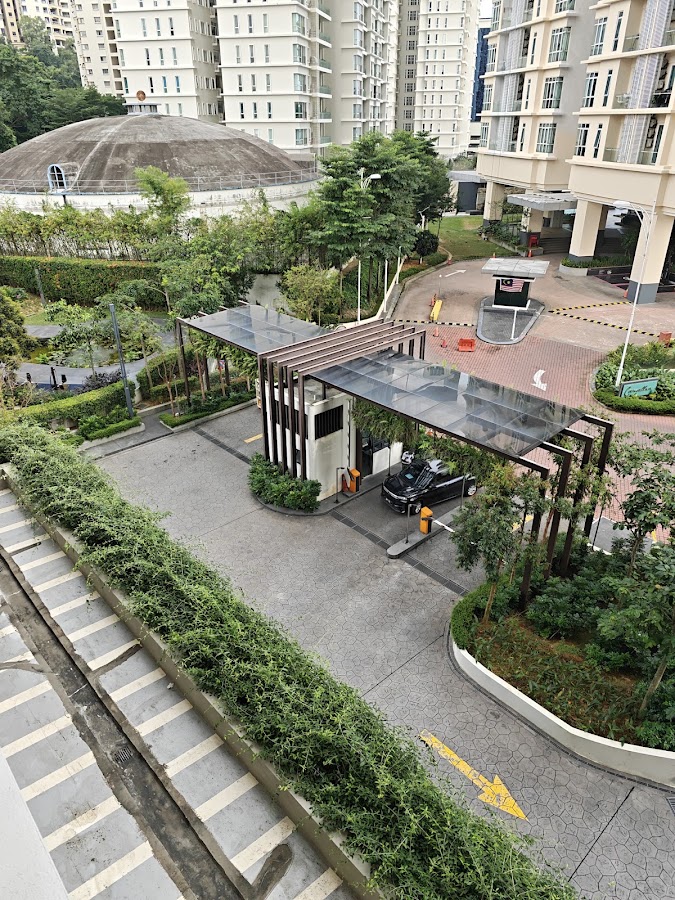 The Goodwood Residence: the guardhouse and barrier at the entrance, from above