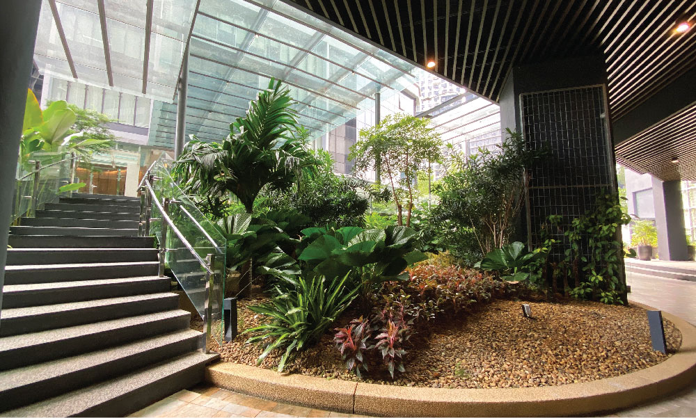 South Link Lifestyle Apartments: a planted stairway under the glass canopy